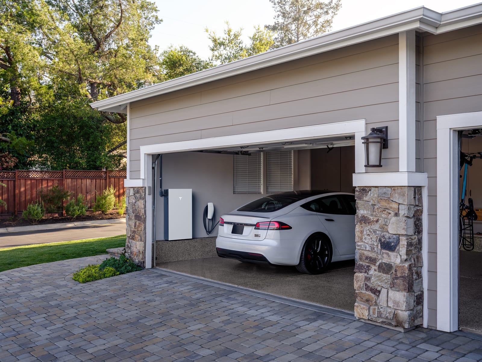 Modern home with exterior electrical lighting at twilight